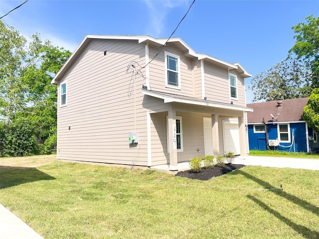 304 N Orange St, Sweeny, TX 77480 - view of property exterior with concrete driveway, a garage, and a lawn