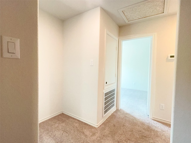 304 N Orange St, Sweeny, TX 77480 - corridor featuring light colored carpet and baseboards