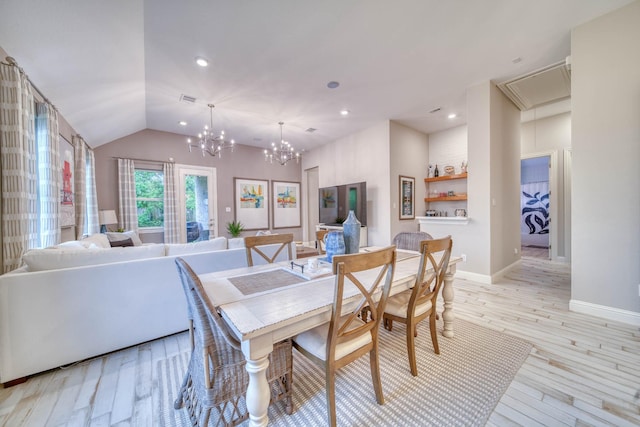 dining area featuring light wood-style flooring, an inviting chandelier, attic access, recessed lighting, and vaulted ceiling