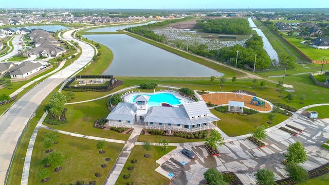 bird's eye view featuring a residential view and a water view