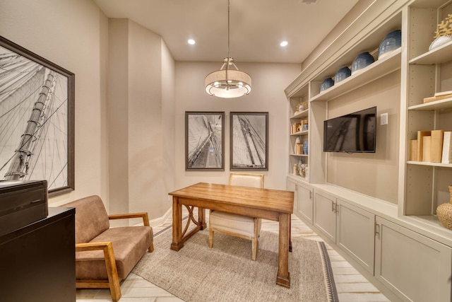 home office featuring built in shelves, recessed lighting, a chandelier, and baseboards
