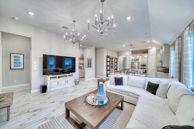 living room featuring recessed lighting, a chandelier, light wood-type flooring, visible vents, and baseboards