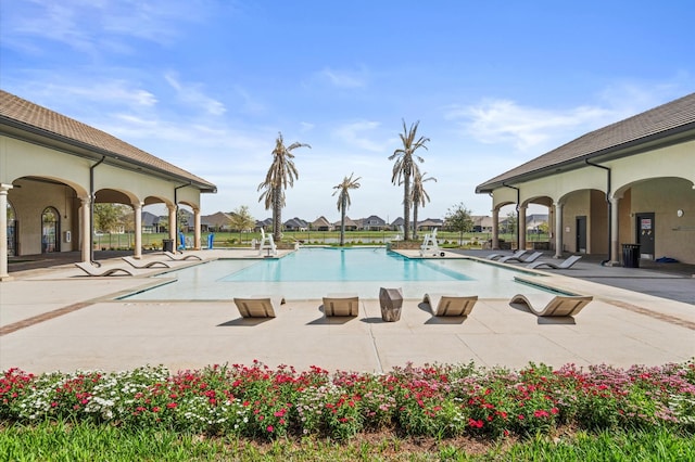 pool featuring a patio area