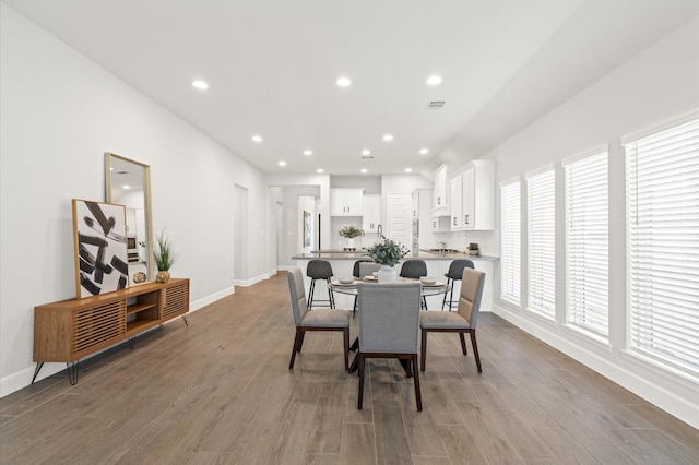 20806 Gray Percheron Ln, Tomball, TX 77377 - dining room featuring wood finished floors and recessed lighting