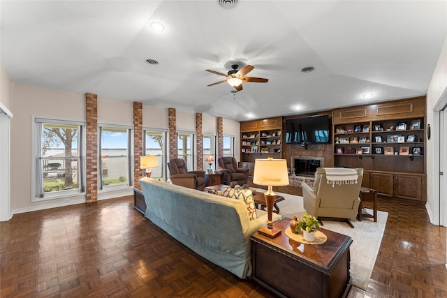 466 Buffalo Ct, Livingston, TX 77351 - living room with a ceiling fan, built in features, a fireplace, baseboards, and recessed lighting