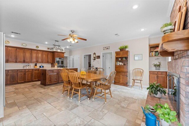 466 Buffalo Ct, Livingston, TX 77351 - dining space featuring recessed lighting, visible vents, a ceiling fan, ornamental molding, and baseboards