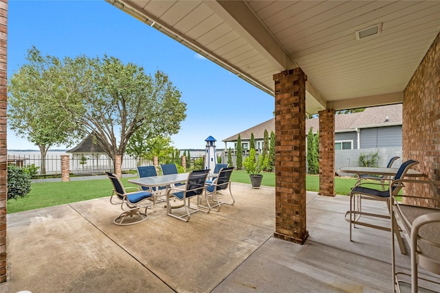 466 Buffalo Ct, Livingston, TX 77351 - view of patio / terrace featuring a fenced backyard and outdoor dining area