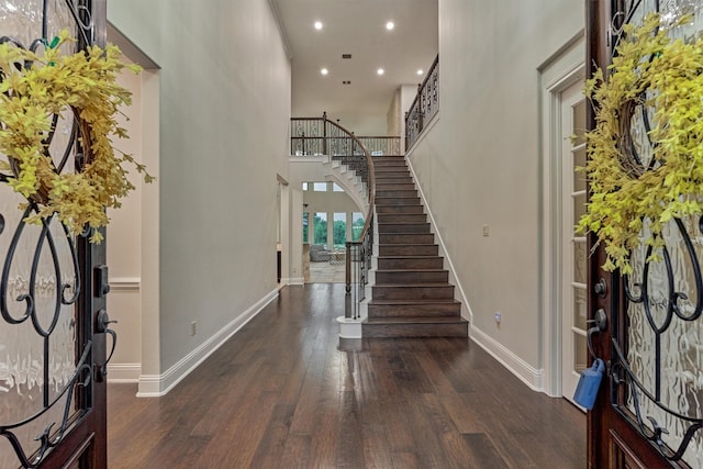 21603 Fairhaven Creek Dr, Cypress, TX 77433 - entryway featuring wood finished floors, stairway, baseboards, recessed lighting, and a high ceiling