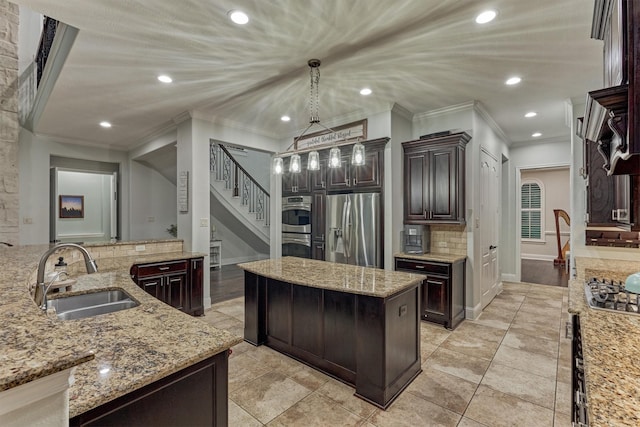 21603 Fairhaven Creek Dr, Cypress, TX 77433 - kitchen featuring a sink, stainless steel appliances, a center island, tasteful backsplash, and ornamental molding