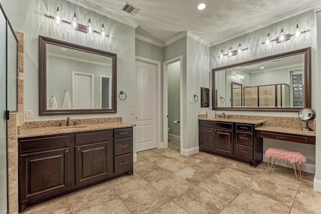 21603 Fairhaven Creek Dr, Cypress, TX 77433 - bathroom with two vanities, ornamental molding, recessed lighting, baseboards, and toilet