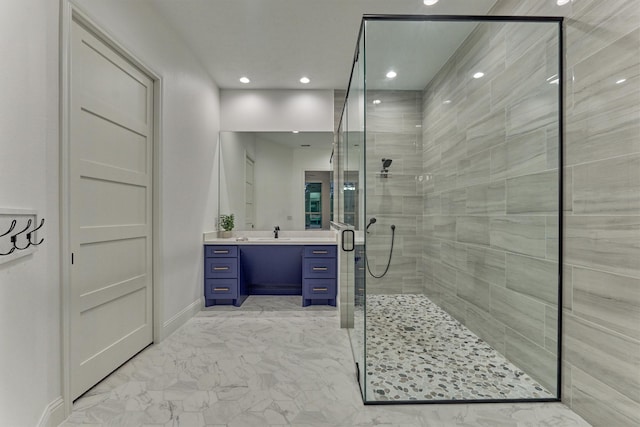 21603 Fairhaven Creek Dr, Cypress, TX 77433 - bathroom with marble finish floors, tiled shower, vanity, baseboards, and recessed lighting