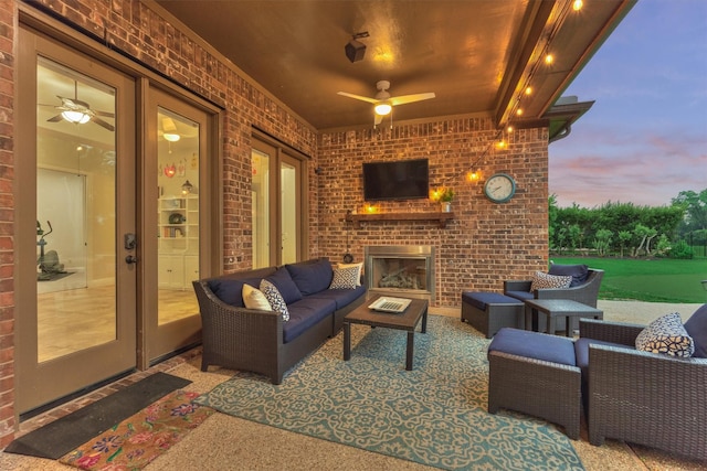 21603 Fairhaven Creek Dr, Cypress, TX 77433 - view of patio / terrace featuring an outdoor living space with a fireplace and ceiling fan
