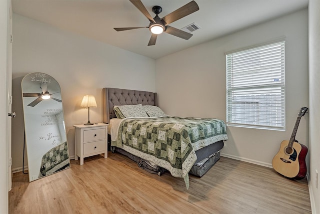 155 Pine Bend Ct, Magnolia, TX 77354 - bedroom featuring wood finished floors, baseboards, and a ceiling fan