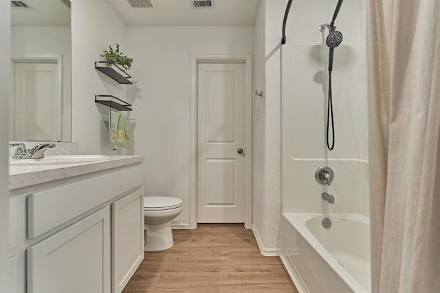 155 Pine Bend Ct, Magnolia, TX 77354 - full bath with wood finished floors, toilet, vanity, shower / bathtub combination with curtain, and baseboards