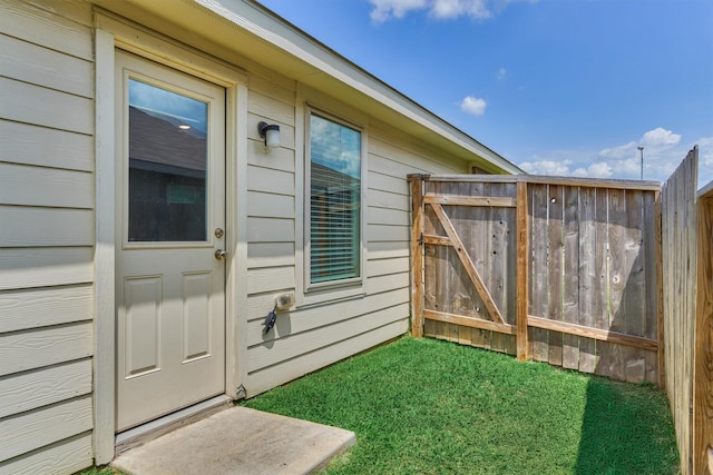 entrance to property with a gate and fence