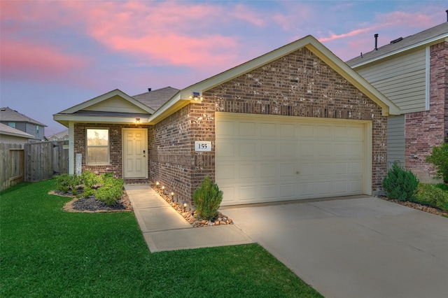 155 Pine Bend Ct, Magnolia, TX 77354 - view of front facade featuring brick siding, an attached garage, and driveway