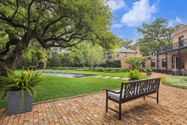 surrounding community featuring a lawn