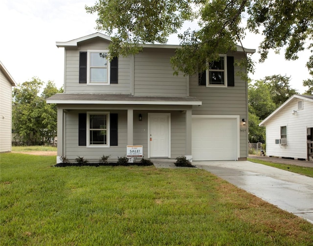 traditional-style house featuring a porch, concrete driveway, an attached garage, a shingled roof, and a front yard