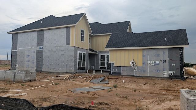 401 Wild Thicket Dr, Katy, TX 77493 - rear view of property with roof with shingles and a patio area