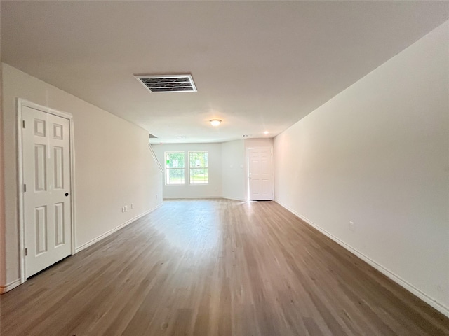 306 N Orange St, Sweeny, TX 77480 - empty room with wood finished floors and baseboards