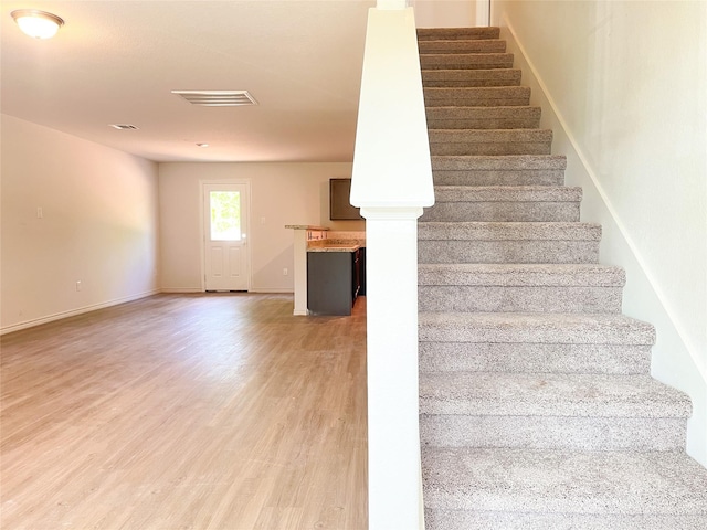 306 N Orange St, Sweeny, TX 77480 - stairs featuring wood finished floors and baseboards