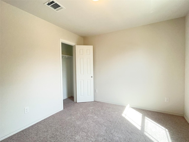 306 N Orange St, Sweeny, TX 77480 - unfurnished bedroom featuring carpet and baseboards