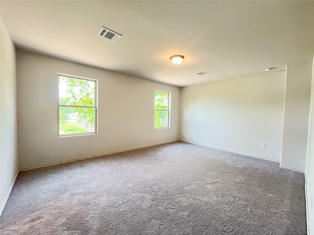 306 N Orange St, Sweeny, TX 77480 - unfurnished room with carpet flooring and baseboards