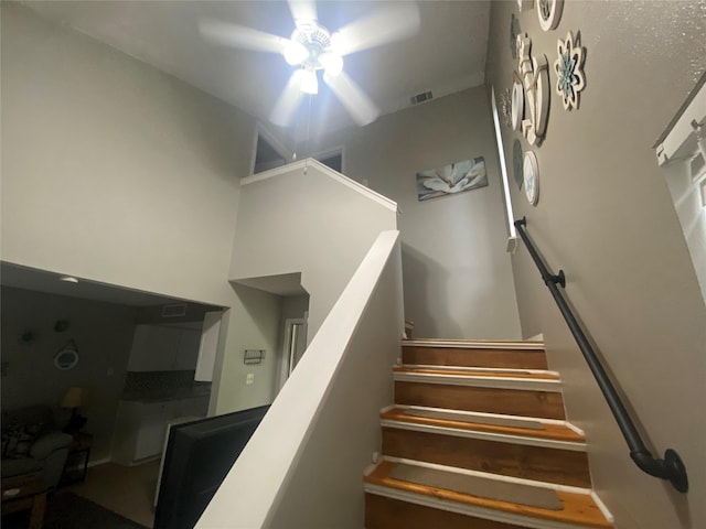 28604 Magnolia Ct, Huntsville, TX 77320 - stairs featuring a ceiling fan and visible vents