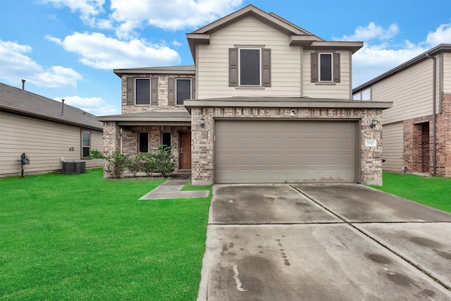traditional-style home featuring an attached garage, a front lawn, brick siding, central AC unit, and concrete driveway