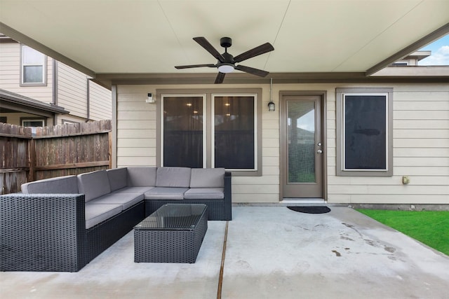 view of patio / terrace featuring outdoor lounge area, fence, and ceiling fan