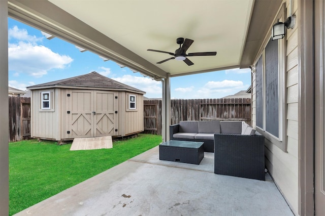 view of patio / terrace with a storage unit, a ceiling fan, outdoor lounge area, and a fenced backyard