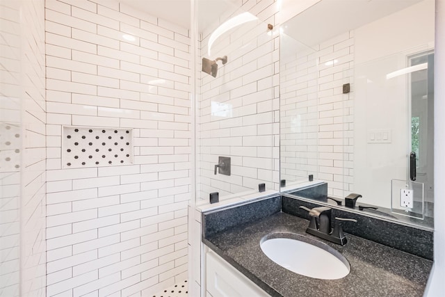 3515 Norris Dr, Houston, TX 77025 - full bathroom with a tile shower, vanity, and tile walls