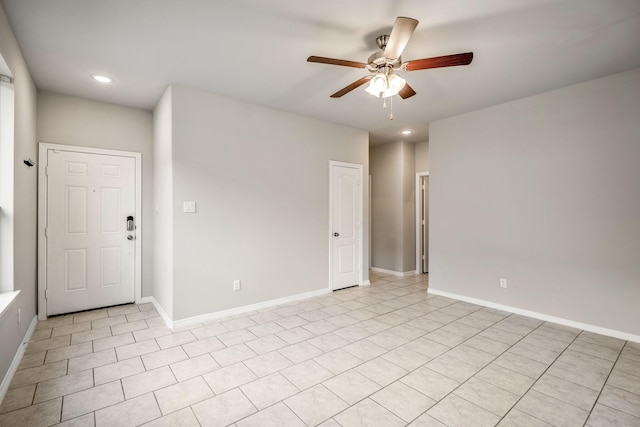 unfurnished room with ceiling fan, baseboards, and recessed lighting