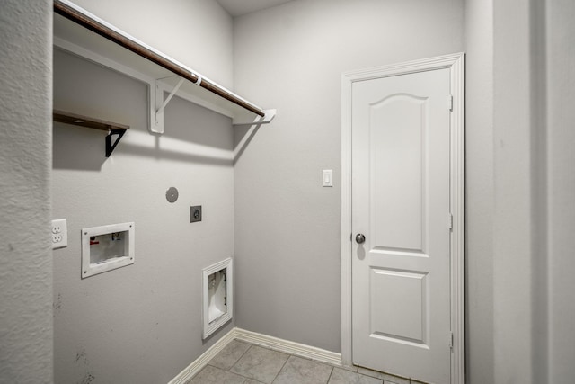 washroom with laundry area, light tile patterned floors, hookup for an electric dryer, baseboards, and washer hookup