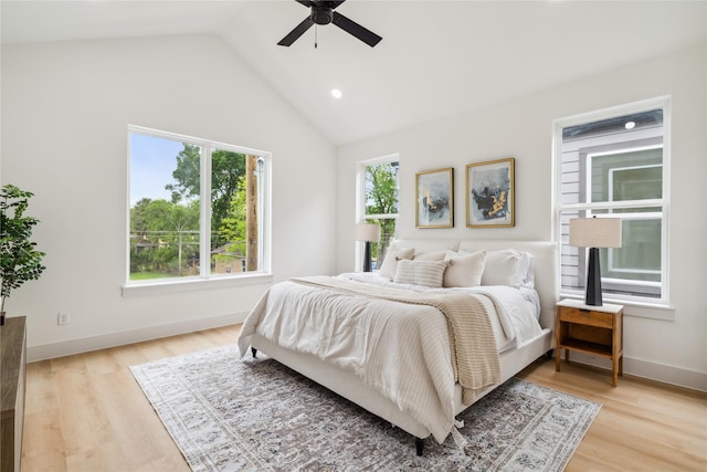 bedroom featuring high vaulted ceiling, a ceiling fan, light wood finished floors, baseboards, and recessed lighting