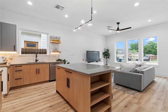6412 Foster St, Houston, TX 77021 - kitchen with a sink, visible vents, ceiling fan, open shelves, and dishwasher
