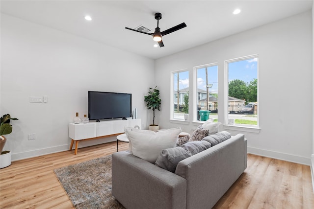 6412 Foster St, Houston, TX 77021 - living area featuring light wood-style floors, visible vents, baseboards, recessed lighting, and a ceiling fan