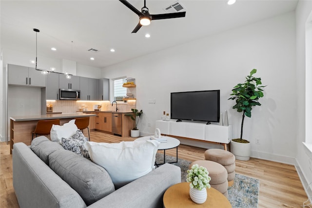 6412 Foster St, Houston, TX 77021 - living area featuring recessed lighting, light wood-style floors, and visible vents