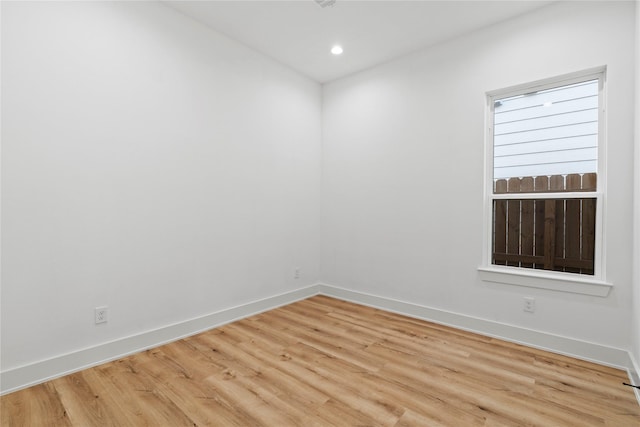 6412 Foster St, Houston, TX 77021 - empty room featuring baseboards, light wood finished floors, and recessed lighting