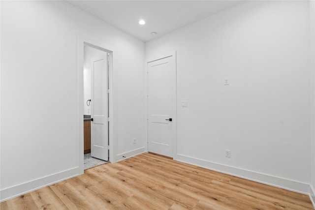 6412 Foster St, Houston, TX 77021 - spare room featuring recessed lighting, baseboards, and light wood-style flooring