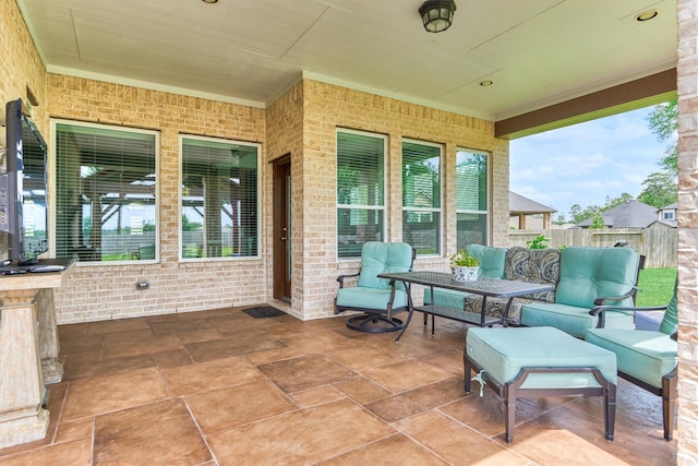 view of patio / terrace featuring fence