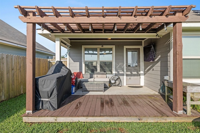 125 Dove Landing Ct, Navasota, TX 77868 - deck with fence, a pergola, and an outdoor hangout area