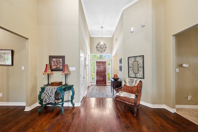 236 Camden Hills Dr, Montgomery, TX 77356 - foyer with a towering ceiling, hardwood / wood-style floors, and crown molding