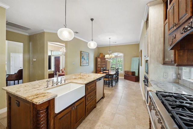 236 Camden Hills Dr, Montgomery, TX 77356 - kitchen featuring a chandelier, appliances with stainless steel finishes, crown molding, light stone counters, and an island with sink