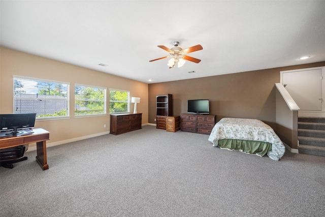 236 Camden Hills Dr, Montgomery, TX 77356 - carpeted bedroom featuring a desk and ceiling fan