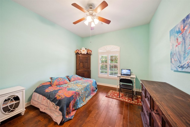 236 Camden Hills Dr, Montgomery, TX 77356 - bedroom featuring dark wood-type flooring, a desk, and a ceiling fan