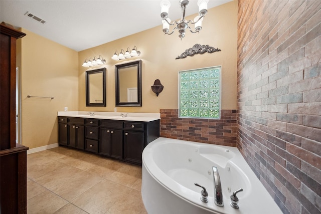 236 Camden Hills Dr, Montgomery, TX 77356 - full bathroom with double vanity, a whirlpool tub, tile patterned floors, and a chandelier