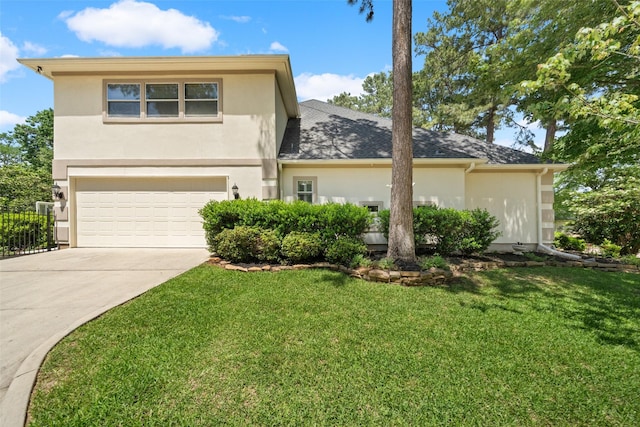236 Camden Hills Dr, Montgomery, TX 77356 - traditional-style house with stucco siding, concrete driveway, an attached garage, a front lawn, and a shingled roof