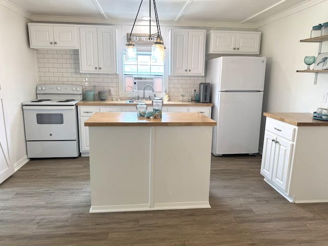 kitchen featuring butcher block countertops, white cabinets, and white appliances