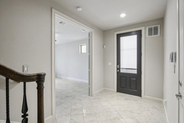 1129 W 21st St, Houston, TX 77008 - entryway with visible vents, baseboards, and recessed lighting